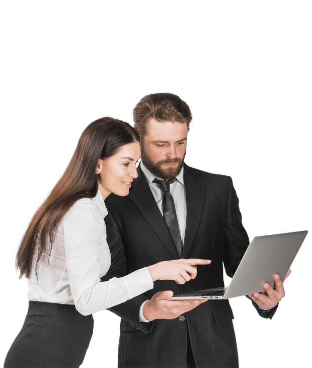 Business woman pointing at something on a laptop held by a businessman.